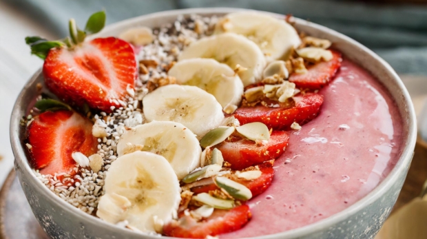 Strawberry and Banana Smoothie Bowl with nuts and seeds
