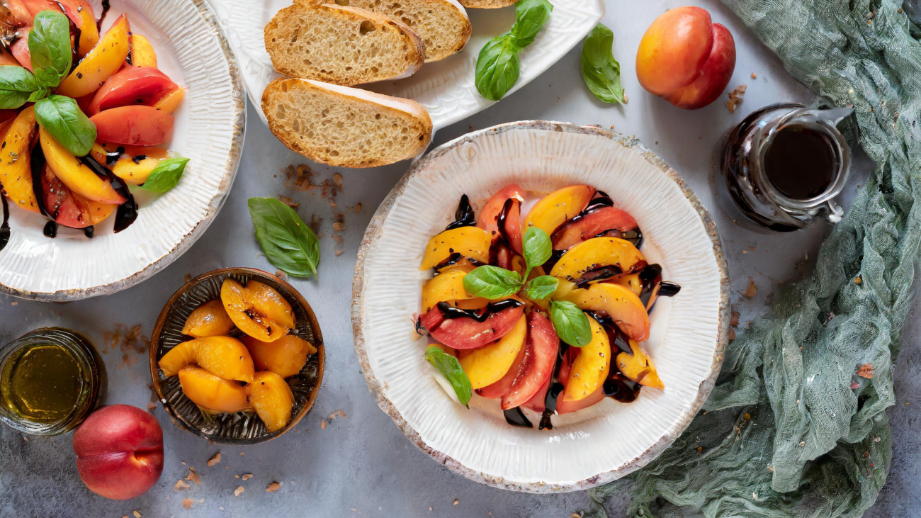 Vegan tomato-peach salad basil